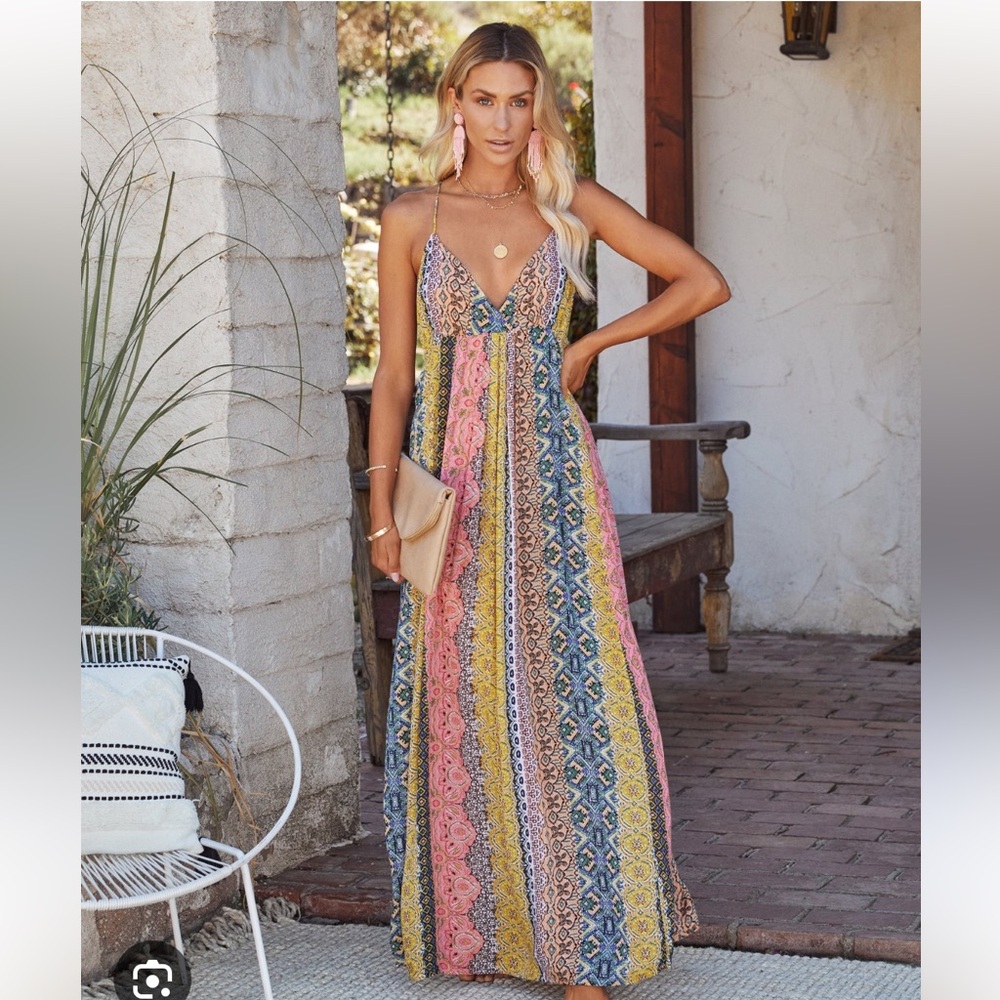 Multicolor maxi dress with low back and adjustable ties. Size small